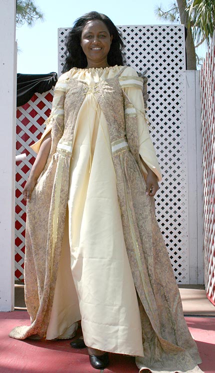 AIFL fashion design graduating student Cheril Levi  is showing a costume at  the Renaissance Festival