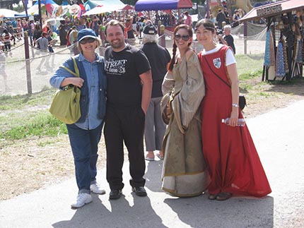 Irina V. Ivanova, instructor of Costume  Concepts class with her students ( left to right) Tomas Tyma , Victoria Gil De Lamadrid, and  Aidjamal Baetova at the Annual Renaissance Festival in Deerfield Beach.